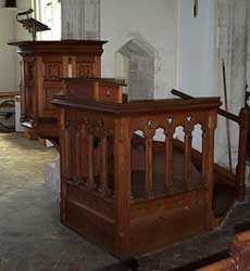 Double pulpit and opening in arch to north aisle
